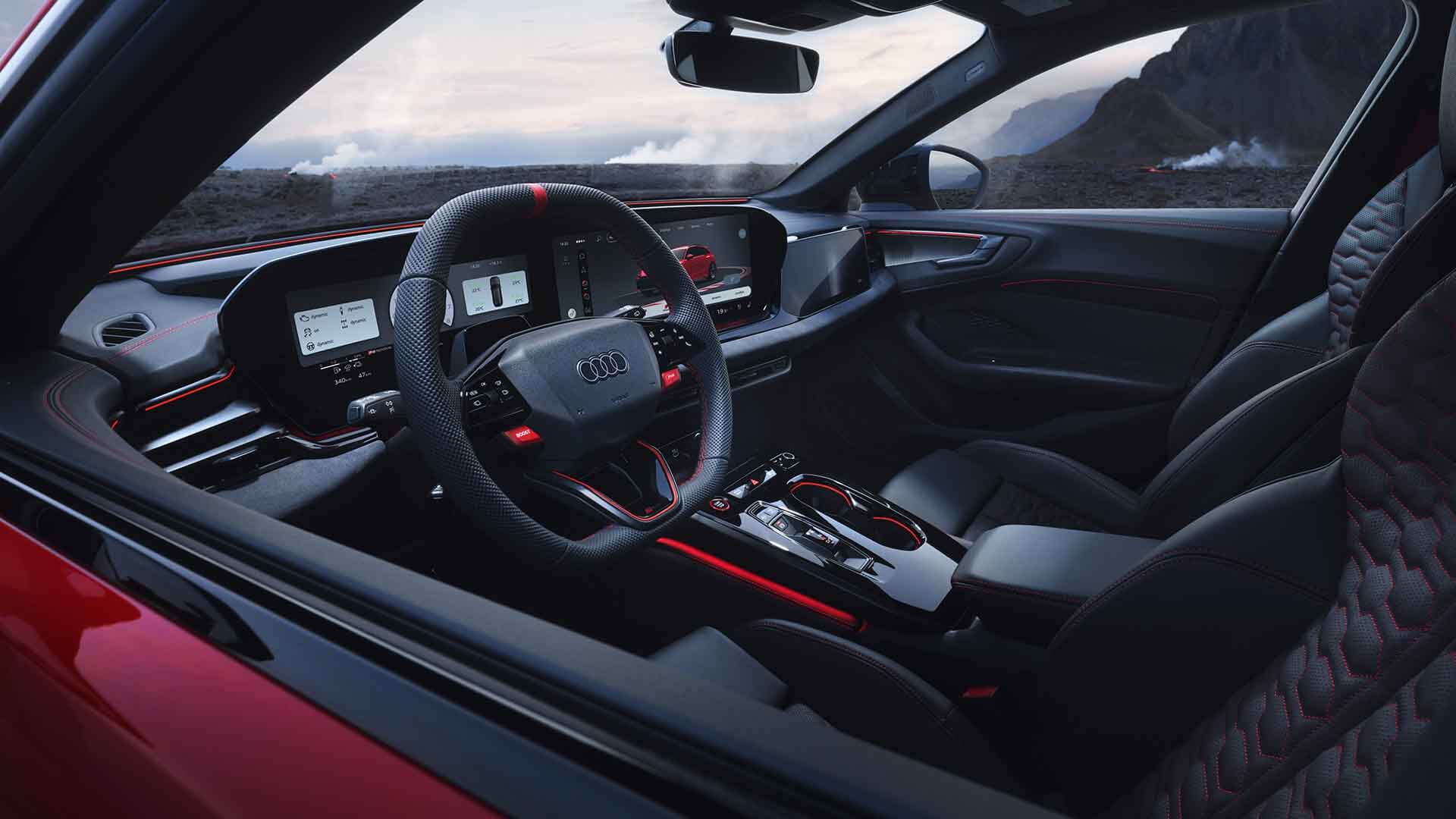 Audi RS 5 Avant, rot, Detailansicht Cockpit mit Lenkrad, Armaturenbrett und Sportsitzen plus
